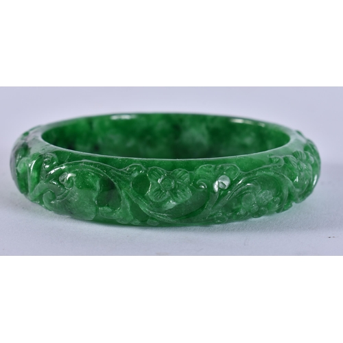 2355 - A CHINESE JADE BANGLE. 67.4 grams. 6 cm wide.