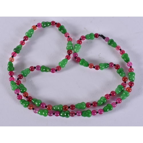 2368 - A CHINESE JADE AND TOURMALINE NECKLACE. 49 grams. 70 cm long.