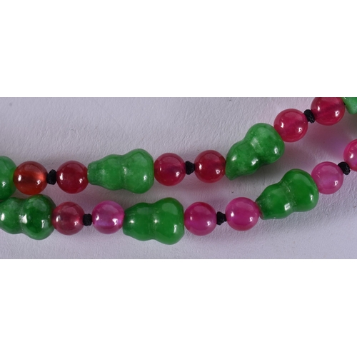 2368 - A CHINESE JADE AND TOURMALINE NECKLACE. 49 grams. 70 cm long.