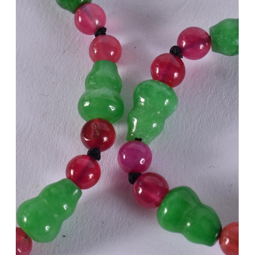 2368 - A CHINESE JADE AND TOURMALINE NECKLACE. 49 grams. 70 cm long.