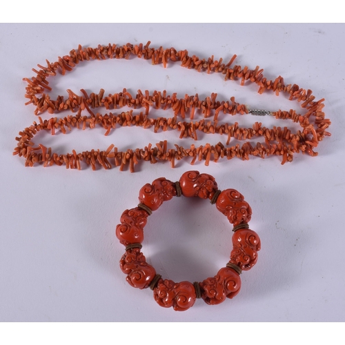 2369 - A CHINESE CORAL NECKLACE and a bracelet. 149 grams. Largest 95 cm long. (2)