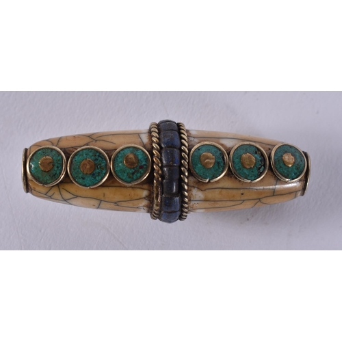 2375 - A TIBETAN ZHU BEAD. 11 grams. 5 cm wide.