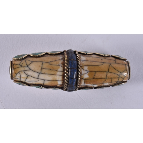 2375 - A TIBETAN ZHU BEAD. 11 grams. 5 cm wide.