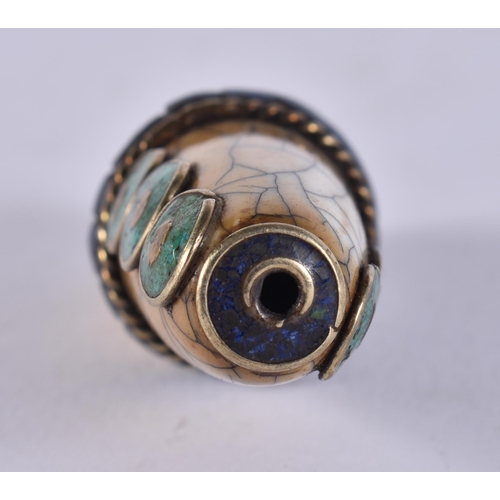 2375 - A TIBETAN ZHU BEAD. 11 grams. 5 cm wide.