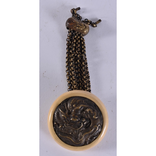 2380 - A 19TH CENTURY JAPANESE MEIJI PERIOD MIXED METAL MANJU NETSUKE. 44.5 grams. 13.25 cm long.