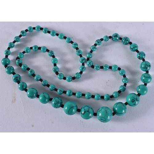 2388 - A CHINESE TURQUOISE NECKLACE. 36 grams. 65 cm long.