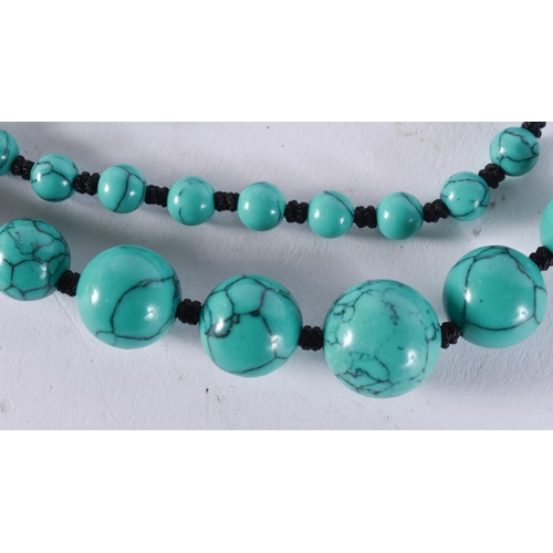 2388 - A CHINESE TURQUOISE NECKLACE. 36 grams. 65 cm long.
