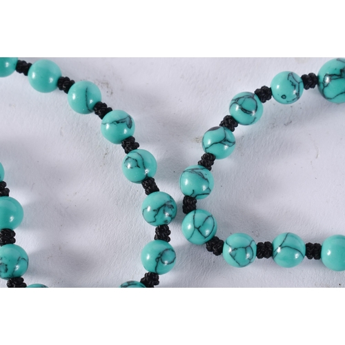 2388 - A CHINESE TURQUOISE NECKLACE. 36 grams. 65 cm long.