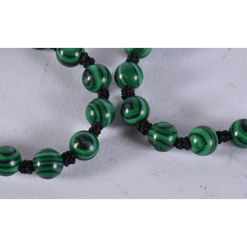 2395 - A CHINESE MALACHITE NECKLACE. 36 grams. 65 cm long.
