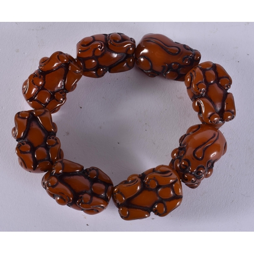 2415 - A CHINESE BRACELET. 86 grams. 6.75 cm wide.