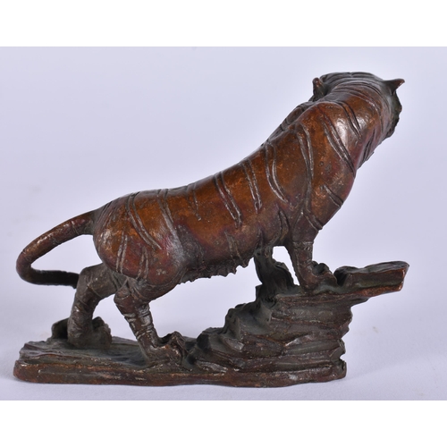 2418 - A JAPANESE BRONZE TIGER. 288 grams. 9 cm x 7 cm.