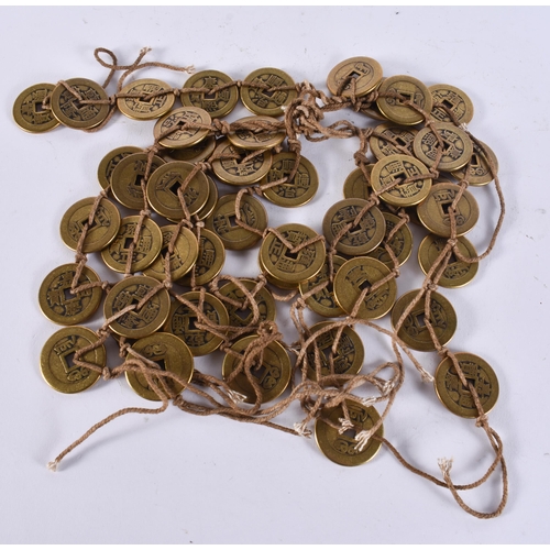 2420 - CHINESE TOKENS. 503 grams. 2.75 cm wide.