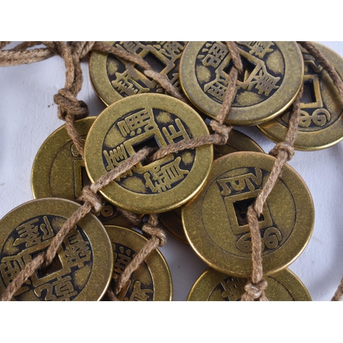 2420 - CHINESE TOKENS. 503 grams. 2.75 cm wide.