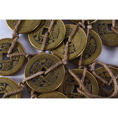 2420 - CHINESE TOKENS. 503 grams. 2.75 cm wide.