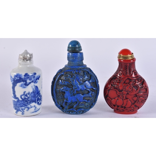 2423 - THREE CHINESE SNUFF BOTTLES. 9 cm high. (3)