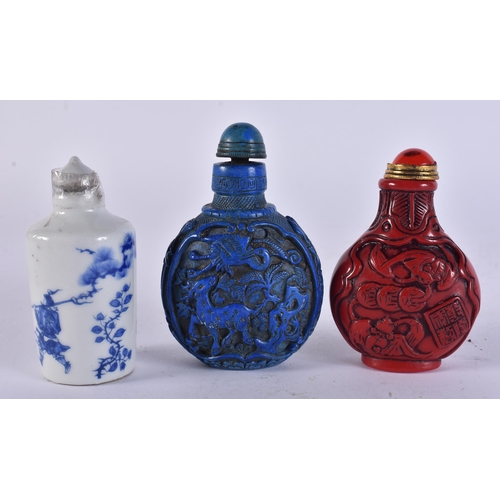 2423 - THREE CHINESE SNUFF BOTTLES. 9 cm high. (3)