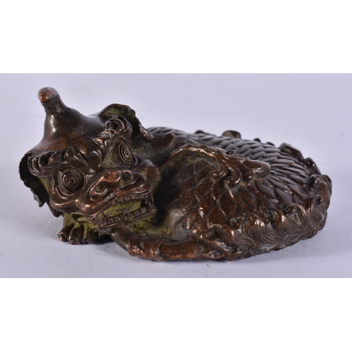 2429 - A JAPANESE BRONZE BEAST. 550 grams. 8.25 cm x 7.5 cm.