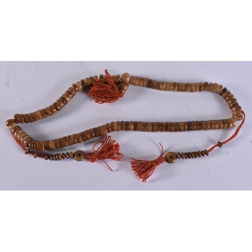 2431 - A TIBETAN NECKLACE. 84 grams. 52 cm long.