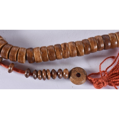 2431 - A TIBETAN NECKLACE. 84 grams. 52 cm long.