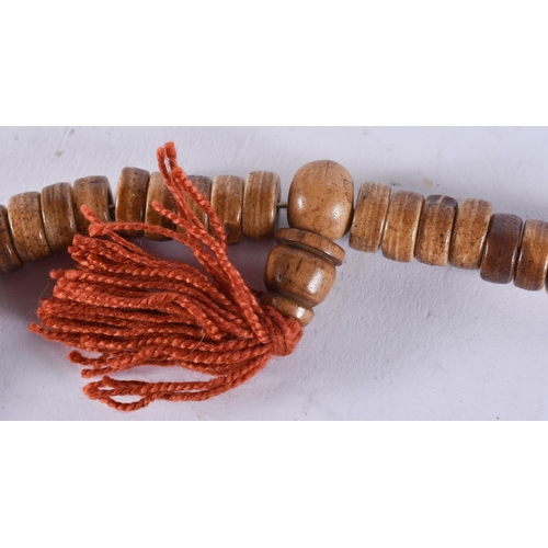 2431 - A TIBETAN NECKLACE. 84 grams. 52 cm long.