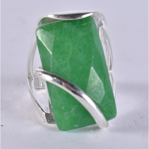 2433 - A CHINESE SILVER AND JADE RING. Q. 14 grams.