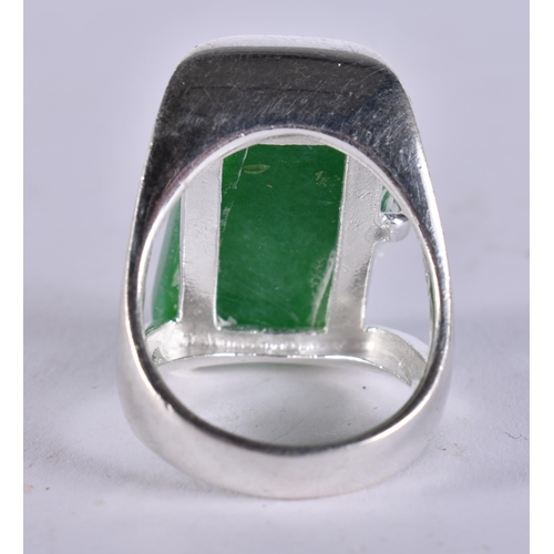 2433 - A CHINESE SILVER AND JADE RING. Q. 14 grams.