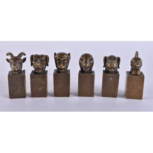 2438 - CHINESE BRONZE SEALS. 709 grams. 5 cm x 3.25 cm. (qty)