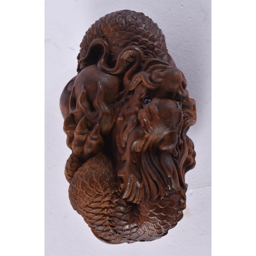 2444 - A JAPANESE CARVED DRAGON. 45 grams. 7.75 cm x 4.5 cm.