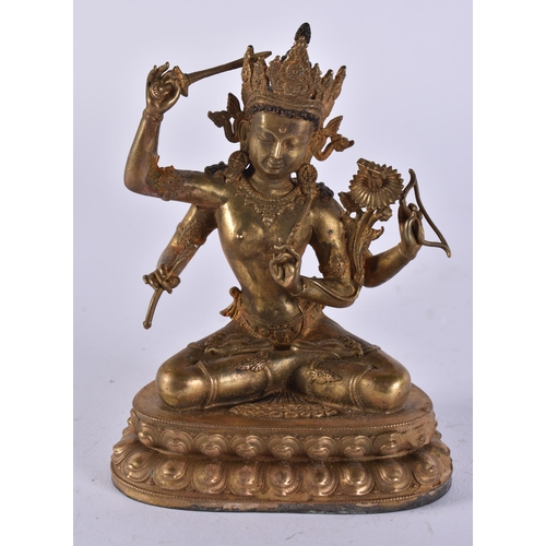 2446 - A CHINESE TIBETAN BRONZE BUDDHA. 501 grams. 10.25 cm x 8 cm.