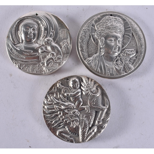 2451 - THREE CHINESE MEDALLIONS. 213 grams. 4.75 cm wide. (3)