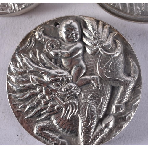 2451 - THREE CHINESE MEDALLIONS. 213 grams. 4.75 cm wide. (3)