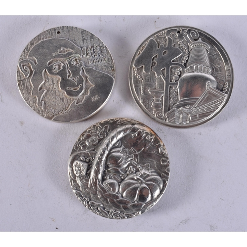 2451 - THREE CHINESE MEDALLIONS. 213 grams. 4.75 cm wide. (3)