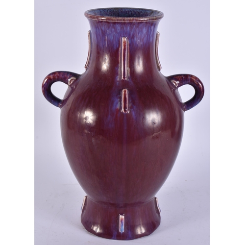 2482 - A LARGE CHINESE FLAMBE GLAZED TWIN HANDLED PORCELAIN VASE. 33 cm x 20 cm.