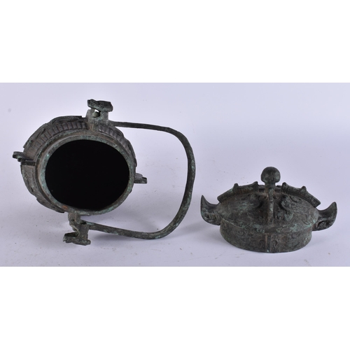 2483 - A RARE CHINESE QING DYNASTY BRONZE SWING HANDLED VESSEL AND COVER. 29 cm high inc handle.