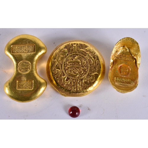 2484 - THREE CHINESE YELLOW METAL SCROLL WEIGHTS. 375 grams. Largest 5 cm wide. (3)