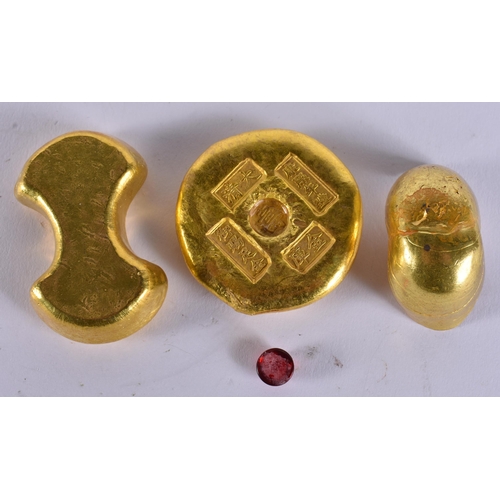 2484 - THREE CHINESE YELLOW METAL SCROLL WEIGHTS. 375 grams. Largest 5 cm wide. (3)