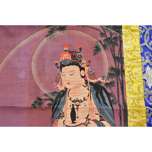 2497 - A CHINESE TIBETAN THANGKA. 120 cm x 60 cm.