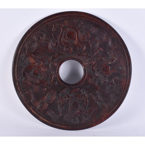 2511 - A LARGE CHINESE STONE BI DISC. 29 cm wide.