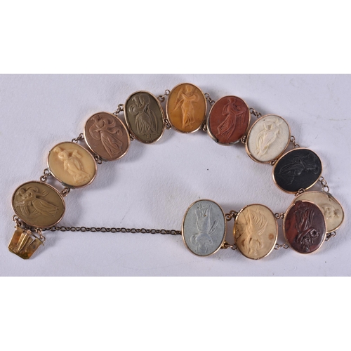 2586 - AN ANTIQUE GOLD GRAND TOUR LAVA STONE CAMEO BRACELET. 10.5 grams. 17 cm long.