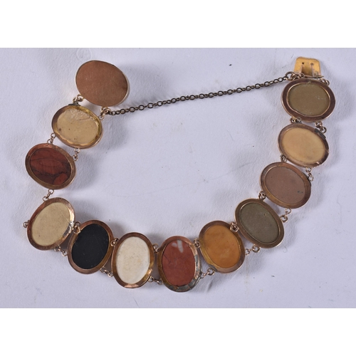 2586 - AN ANTIQUE GOLD GRAND TOUR LAVA STONE CAMEO BRACELET. 10.5 grams. 17 cm long.