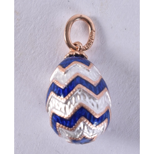 2587 - A 14CT GOLD EGG PENDANT. 2.6 grams. 2.25 cm x 1.25 cm.