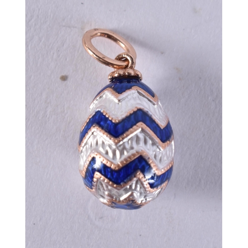 2587 - A 14CT GOLD EGG PENDANT. 2.6 grams. 2.25 cm x 1.25 cm.