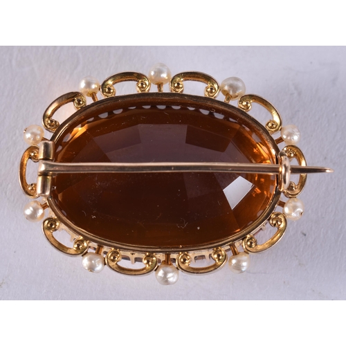 2613 - AN 18CT GOLD CITRINE BROOCH. 18.4 grams. 2.75 cm x 3.5 cm.