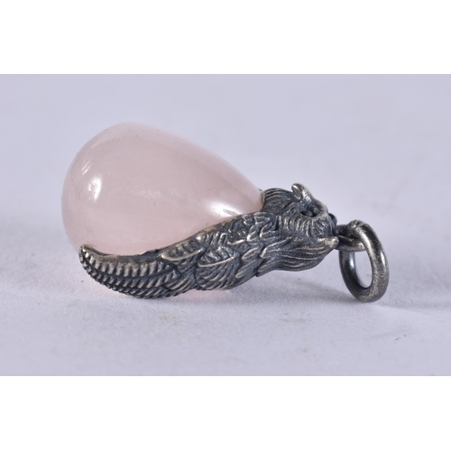 2642 - A SILVER AND ROSE QUARTZ PENDANT. 6 grams. 2.75 cm x 1.5 cm.