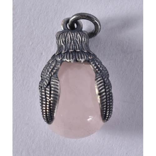 2642 - A SILVER AND ROSE QUARTZ PENDANT. 6 grams. 2.75 cm x 1.5 cm.