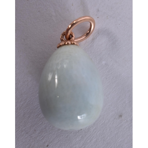 2643 - A 14CT GOLD AND ENAMEL PENDANT. 3.4 grams. 2.5 cm x 1.25 cm.