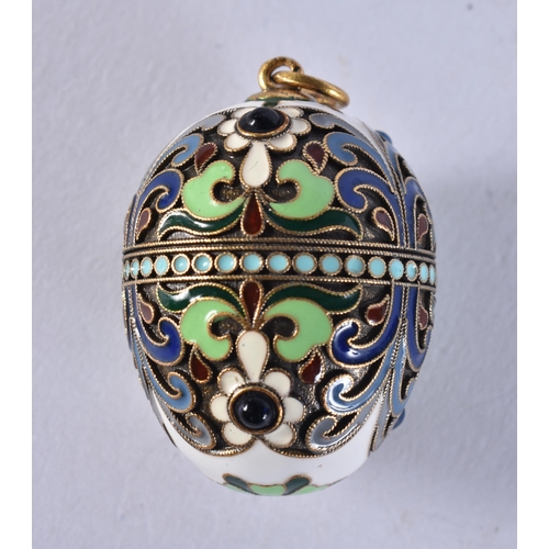 2646 - A LARGE SILVER AND ENAMEL EGG PENDANT. 15.6 grams. 3.75 cm x 2.5 cm.