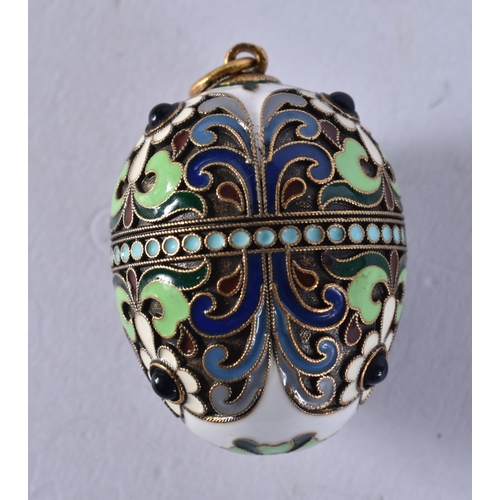 2646 - A LARGE SILVER AND ENAMEL EGG PENDANT. 15.6 grams. 3.75 cm x 2.5 cm.