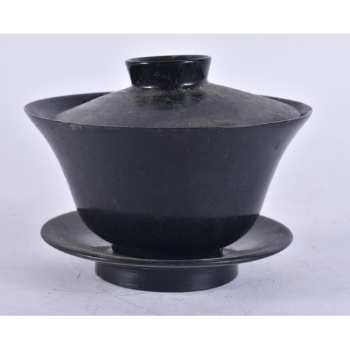 2671 - A CHINESE JADE TEABOWL ON STAND. 10 cm wide.