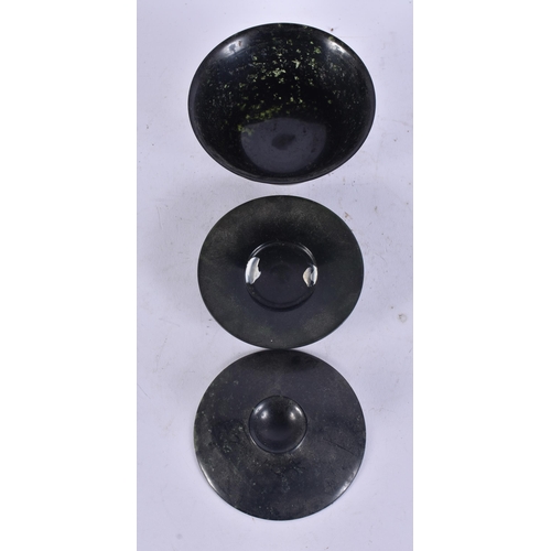 2671 - A CHINESE JADE TEABOWL ON STAND. 10 cm wide.
